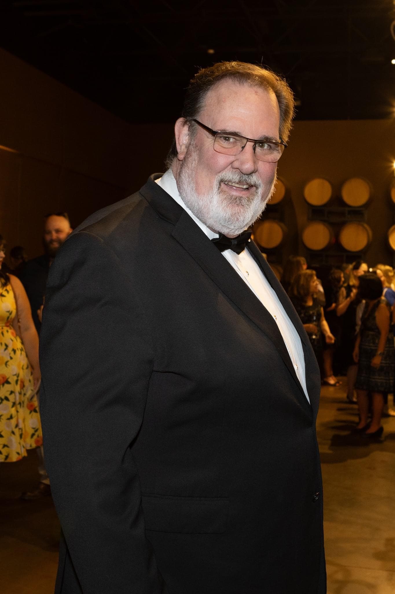 Auctioneer Frank "Big Frank" Jakubka in a tuxedo and bow tie at a black-tie event