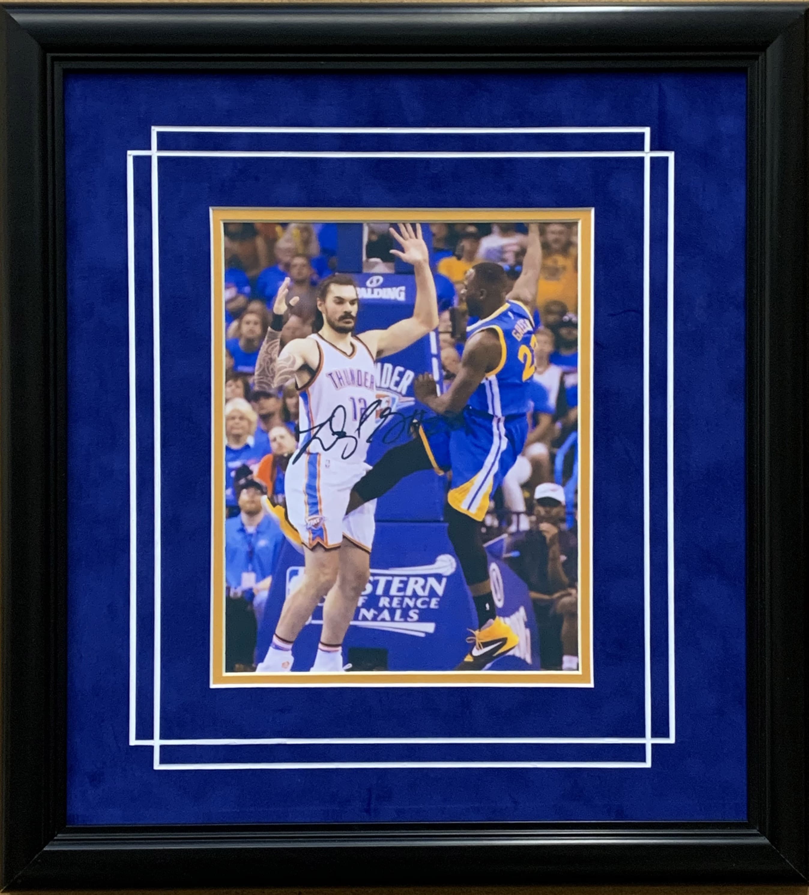 Framed Draymond Green action print in a blue mount with reproduced signature, offered as a fundraiser auction lot