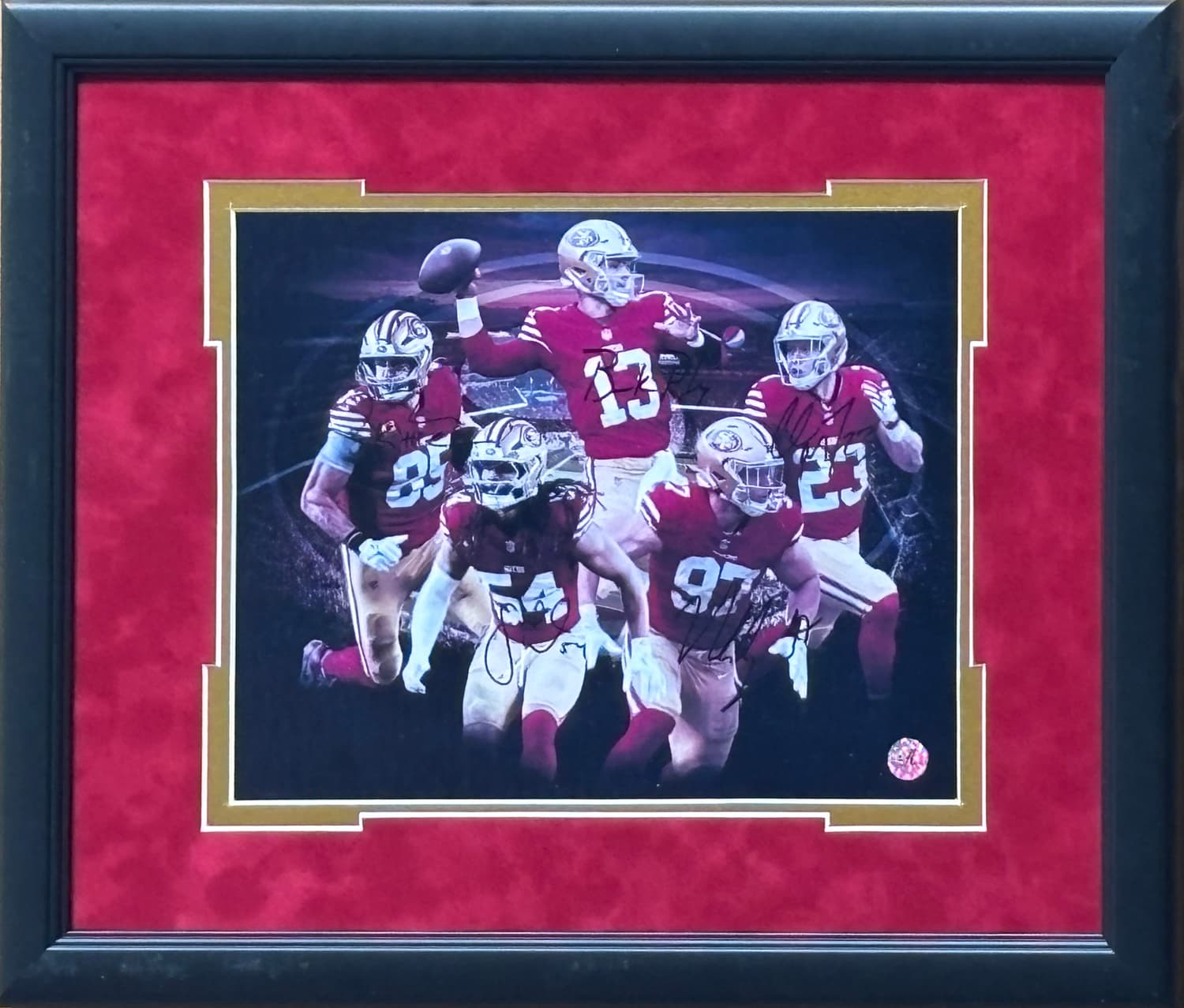 Framed San Francisco 49ers five stars 11 by 14 action print with reproduced signatures, offered as a charity auction lot